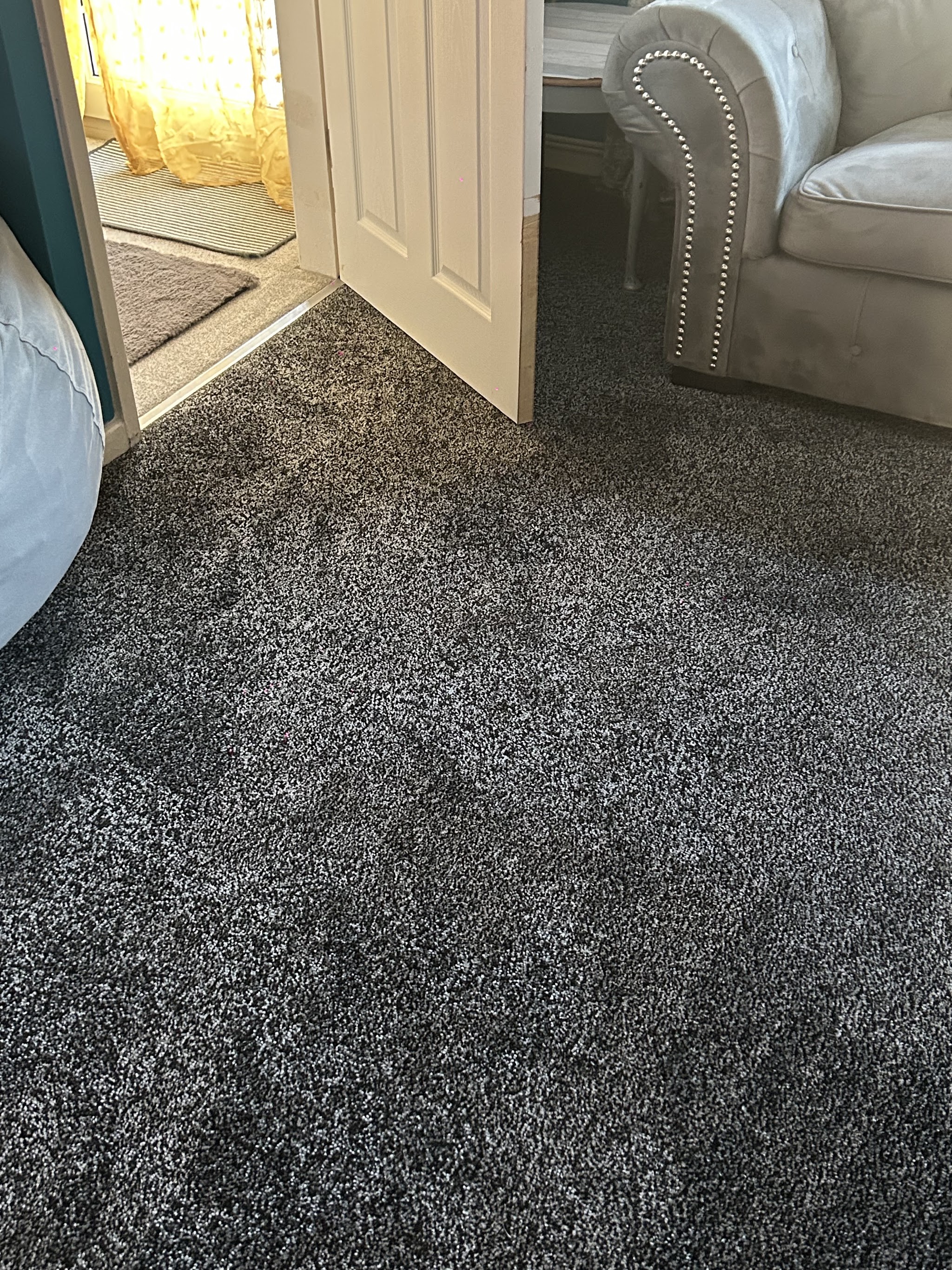 Dark grey twist carpet fitted in a lounge